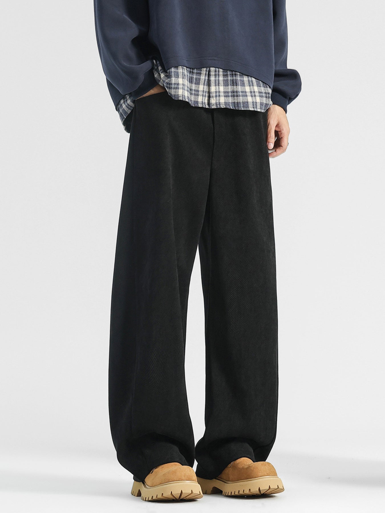 Men's black loose fit sweatpants with pockets, wide leg, casual style.