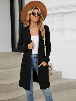 Black textured ribbed knit duster cardigan with pockets and open front.