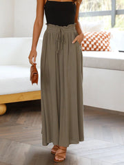 Textured drawstring palazzo trousers in Olive Brown with ruffled waist and pockets.