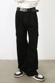 Black pleated cargo denim trousers with a relaxed fit and side pockets.