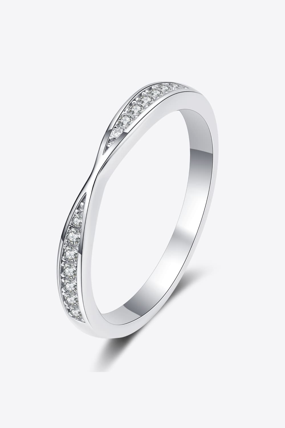 Silver twisted band ring with pavé set cubic zirconia stones