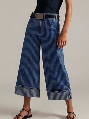 Dark blue striped high-waisted cropped jeans with wide legs and cuffed hems.