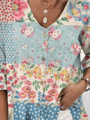 Light blue patchwork floral V-neck blouse with buttons