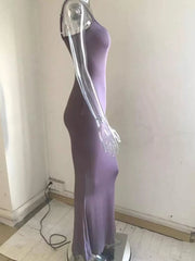 Mauve spaghetti strap bodycon maxi dress with a sleek, floor-length silhouette.