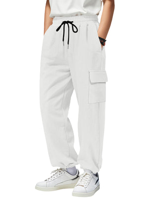White waffle knit joggers with drawstring and cargo pockets.