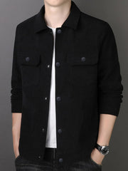 Black corduroy button-down jacket with two chest pockets and button closure.