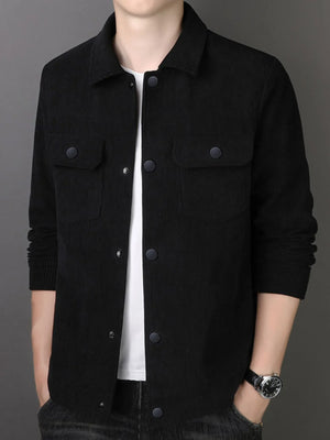 Black corduroy button-down jacket with two chest pockets and button closure.