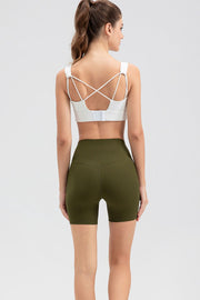 Army green ribbed contour active bike shorts with a high waist.