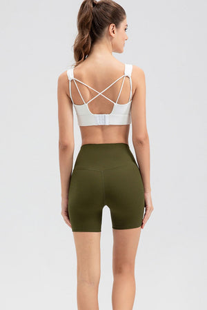 Army green ribbed contour active bike shorts with a high waist.