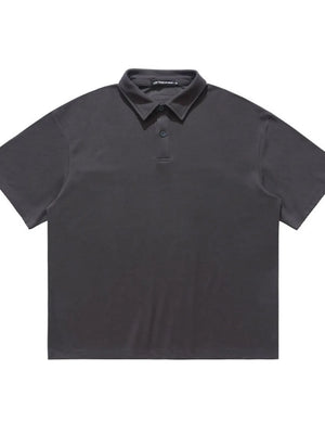 Dark Gray cotton blend polo shirt with buttoned placket and classic collar.