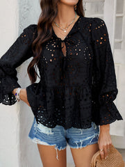 Black eyelet embroidered peplum blouse with tie neck and bell sleeves
