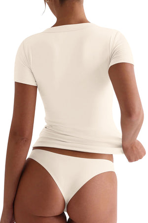 Eggshell V-neck second-skin tee, short sleeves, form-fitting.