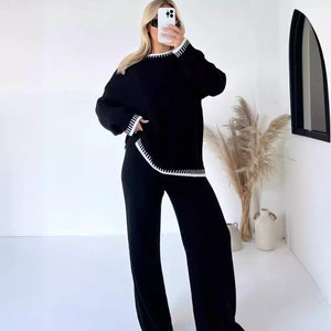Black relaxed sweater set with contrast trim, wide leg pants, and crew neck sweater.