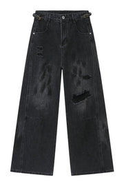 Dark wash relaxed fit denim jeans with distressed details and a buckle belt.