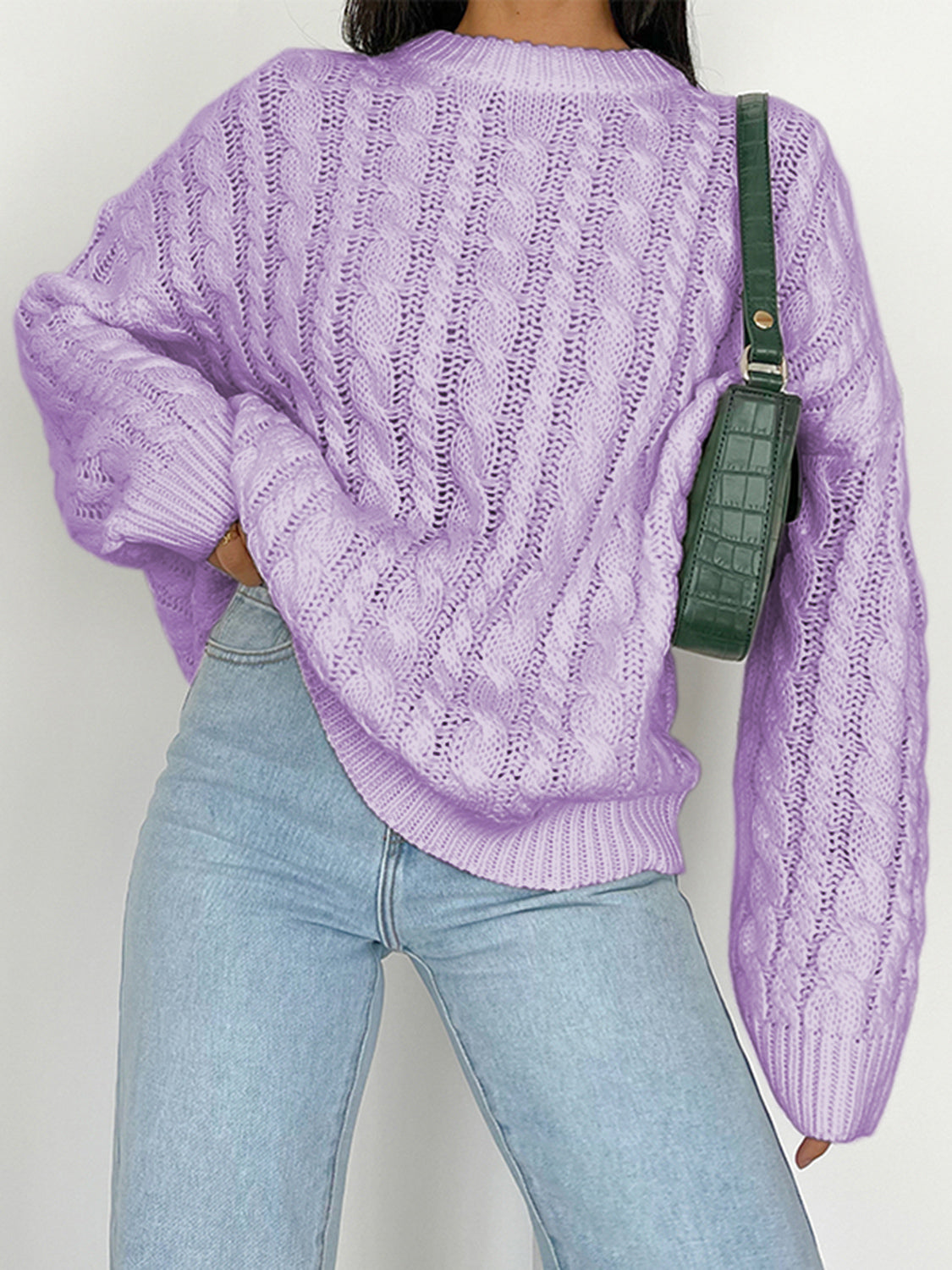 Lavender acrylic cable knit sweater with openwork detail and crew neck.