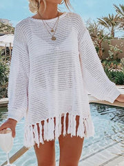 White open-knit acrylic beach cover-up with fringe hem and long sleeves.