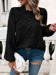 Black eyelet embroidered blouse with ruffle collar and button front.