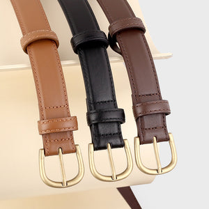 Three cowhide leather belts in coffee brown, black, and brown with antique brass buckles.
