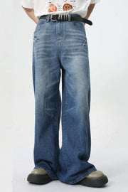 Oversized denim palazzo trousers in medium wash with a relaxed fit and wide leg.