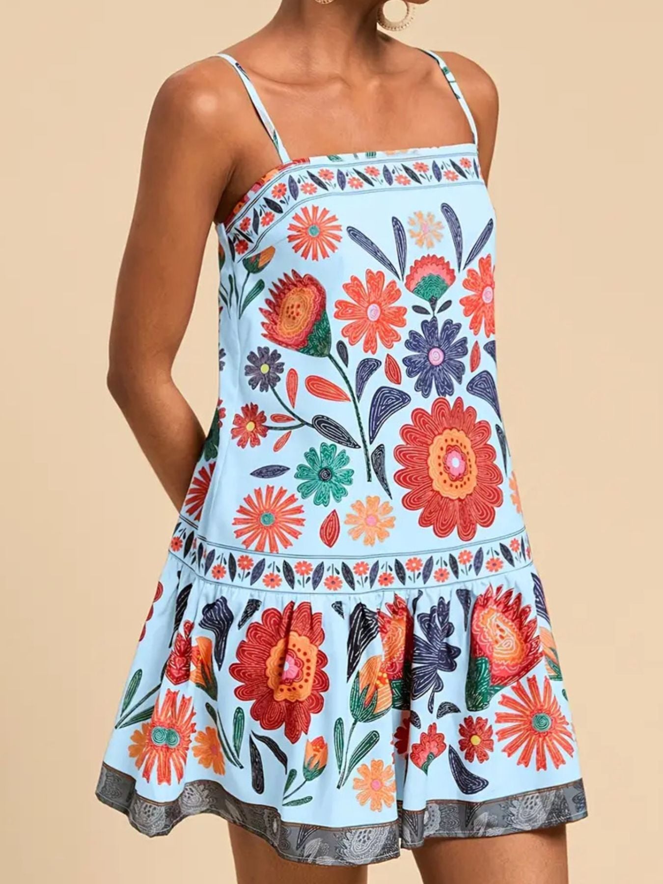 Light blue floral print mini dress with square neckline and tiered hem