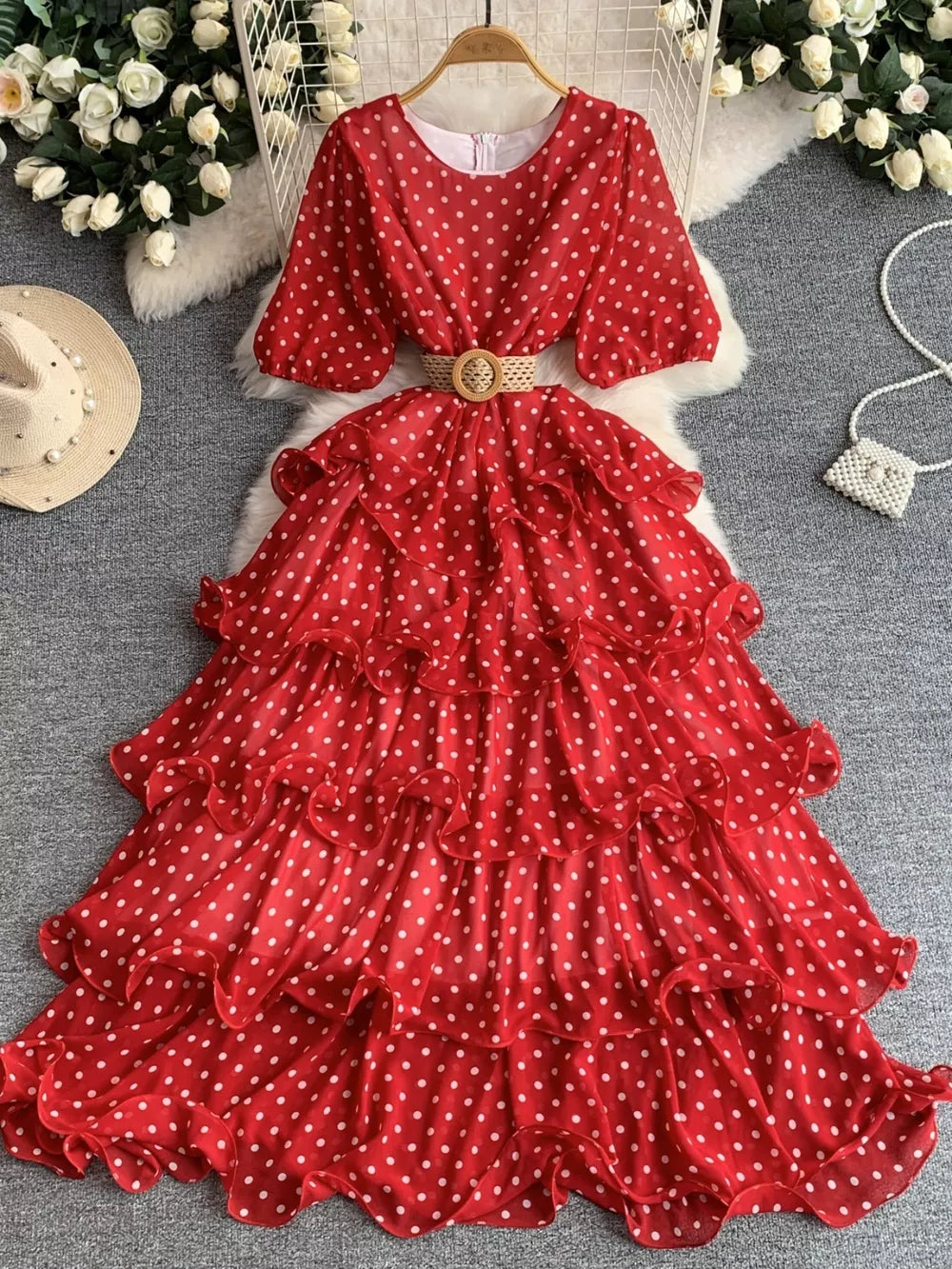 Red polka dot tiered ruffle dress with puff sleeves and belt