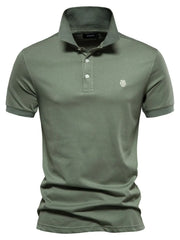 Moss green tailored cotton polo shirt with embroidered crest detail.