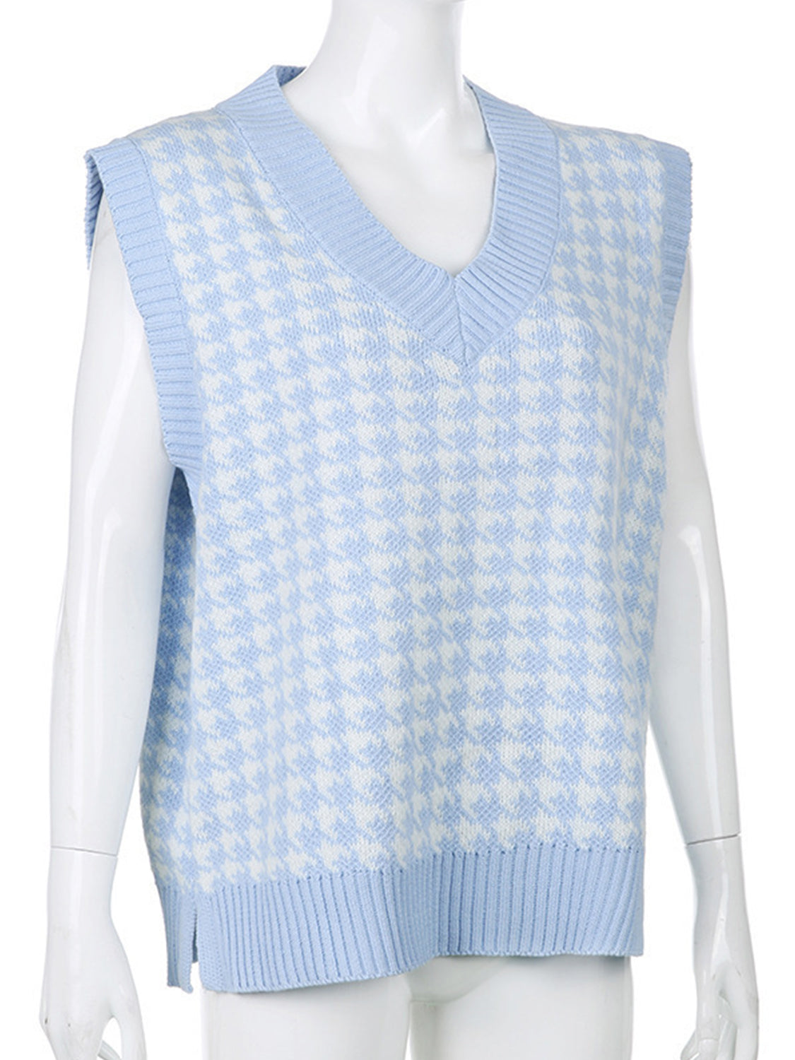 Houndstooth knit V-neck tank top in light blue and white, with ribbed trim.