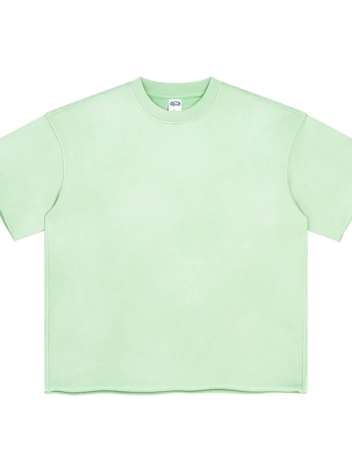 Light green boxy t-shirt with raw hem and crew neck.