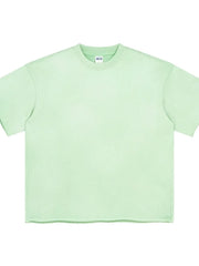 Light green boxy t-shirt with raw hem and crew neck.
