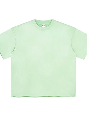 Light green boxy t-shirt with raw hem and crew neck.