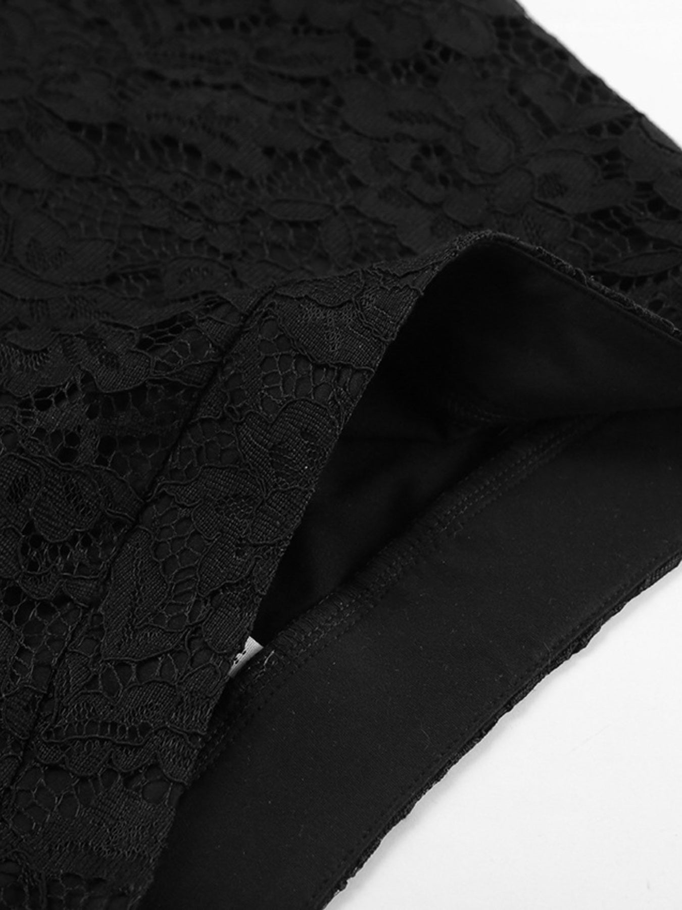 Black lace maxi skirt with sheer detail and elastic waistband.