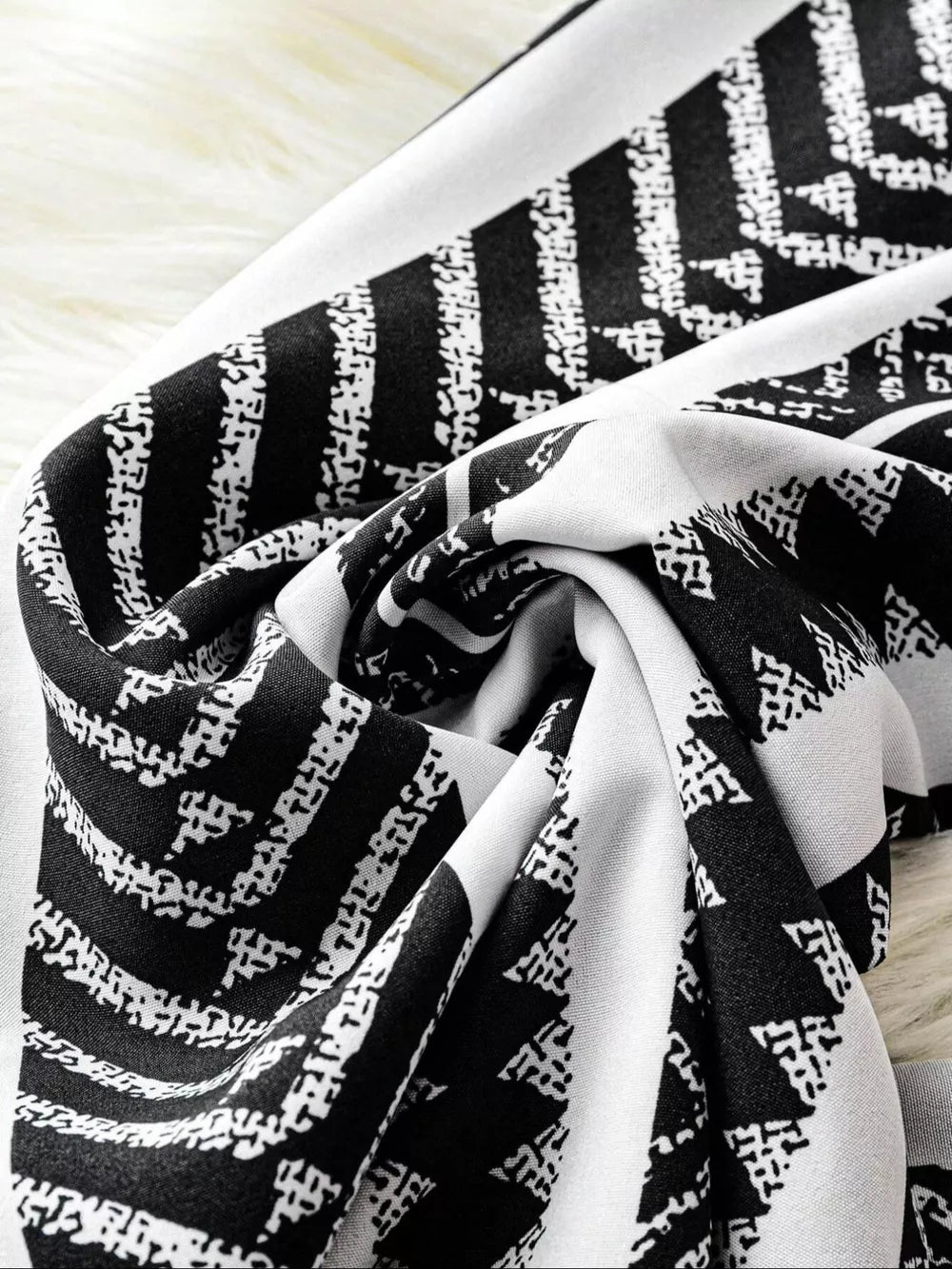 Black and white geometric print wide-leg maternity pants with bow detail
