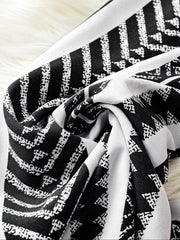 Black and white geometric print wide-leg maternity pants with bow detail