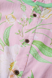 Pink floral cotton dress with puff sleeves and button detail