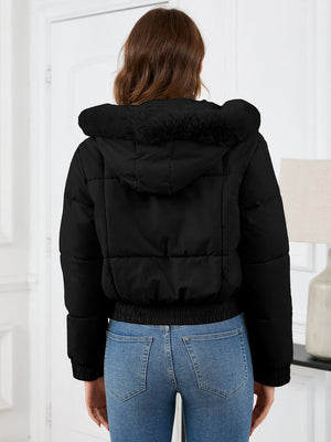 Black puffer jacket with faux fur trimmed hood and elasticated hem