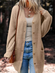 Fuzzy camel front-button cardigan with pockets and a relaxed fit.