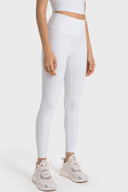 White seamless high-waist performance leggings with a sculpted fit and full length.