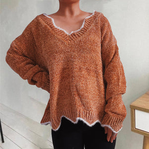 Caramel v-neck knit sweater with scalloped trim and fuzzy texture.