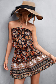 Floral print bandeau mini dress in black with ruffled hem and tiered skirt.