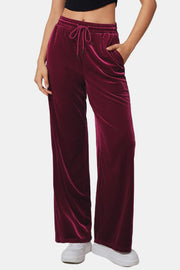 Burgundy velvet palazzo lounge trousers with drawstring waist and pockets