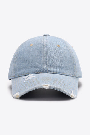 Light blue denim baseball cap with distressed brim and adjustable strap.