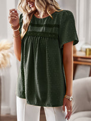 Textured puff sleeve yoke top in Black Forest with crochet trim and dot pattern.