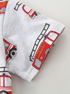 Light grey t-shirt with all-over red fire truck print and short sleeves.
