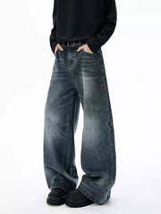 Belted dark-wash wide-leg jeans with unique paneled design and a relaxed fit.