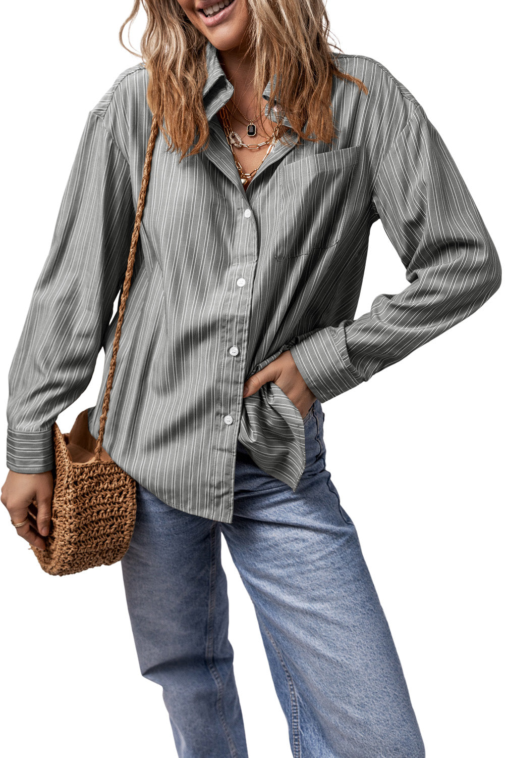 Oversized gray striped Oxford shirt with button front and chest pocket.