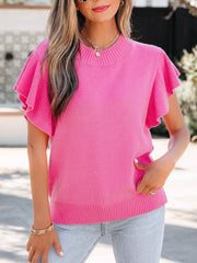 Pink knit top with ruffled short sleeves and mock neckline