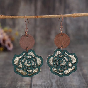 Layered rosewood drop earrings with rose design, gold glitter detail, and wood backing.