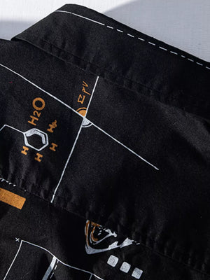 Black cotton blend long johns with white and gold science graphic print