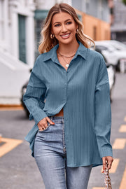 Sky blue textured oversized shirt with button front and tie back detail