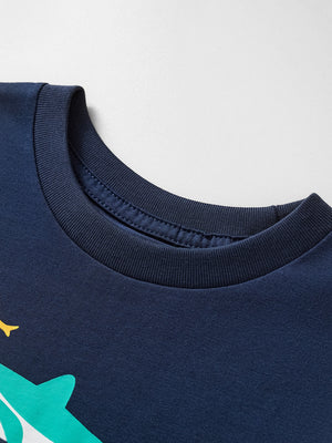 Navy cotton crew neck t-shirt with a whimsical shark print detail.